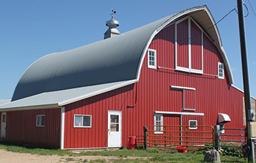 Old barn with new steel siding supplied by Long Prairie Lumber