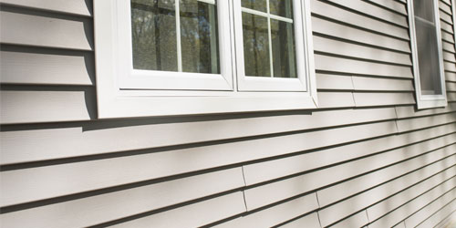 Side view of a house with vinyl siding